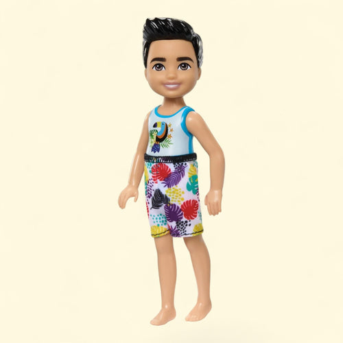 Barbie Chelsea Small Doll with Beach Swimsuit, Toucan & Tropical Leaf Print, Black Hair & Brown Eyes, 6 inches